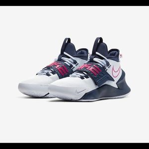 Size 7 Youth/ 8.5 Woman’s Nike basketball sneakers